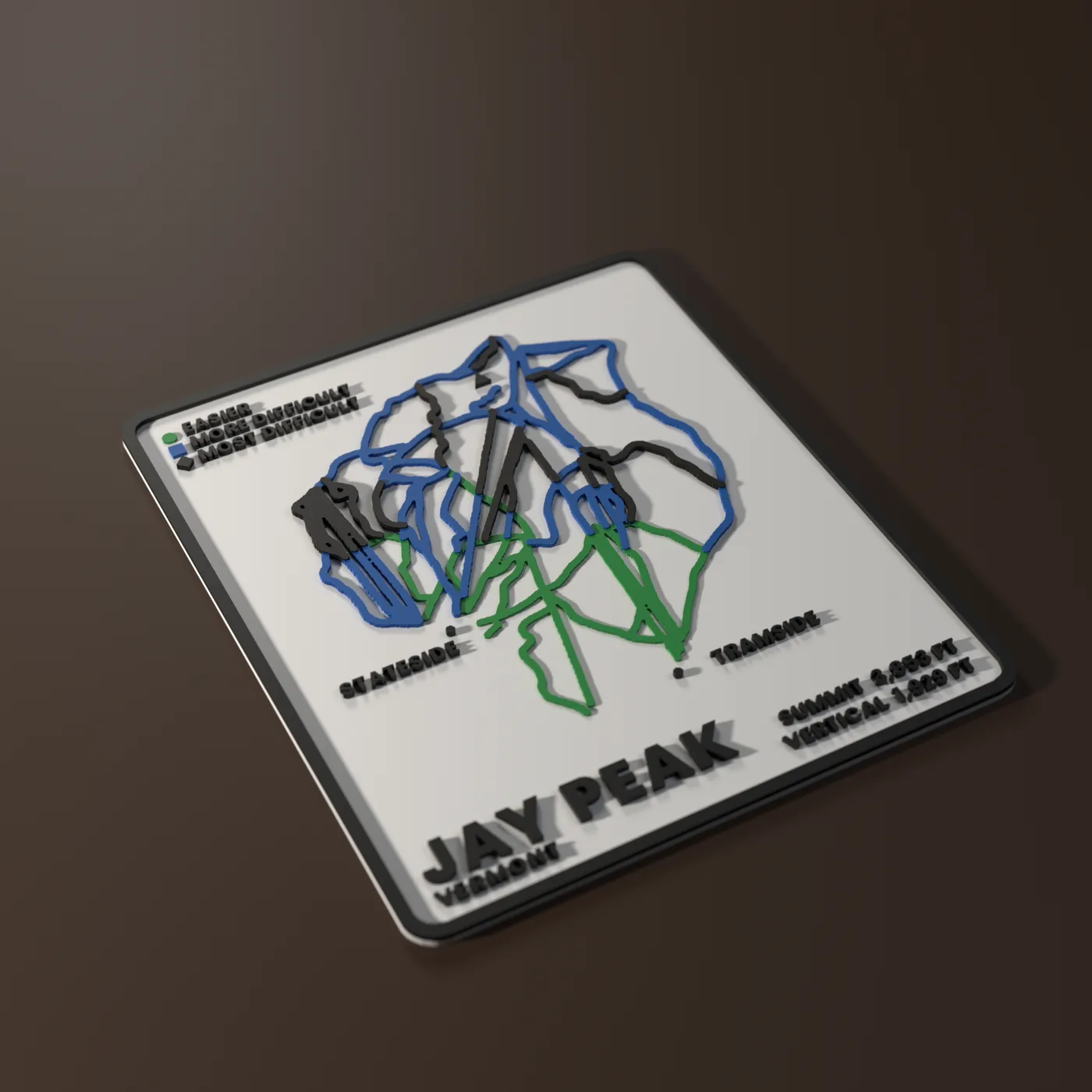 Jay Peak SKIYEE plaque: raised green, blue and black trails on a white base with a black frame